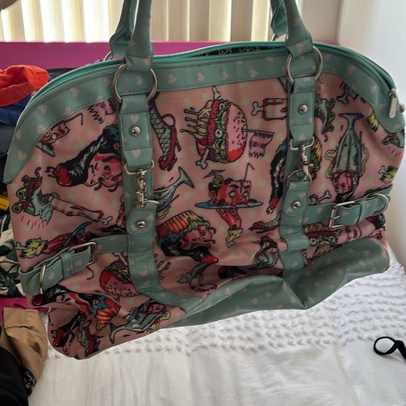 Iron Fist Pink and Blue Travel Bags with Whimsical Design - Picture 3 of 5